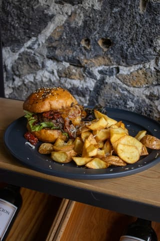 DE LA PARRILLA